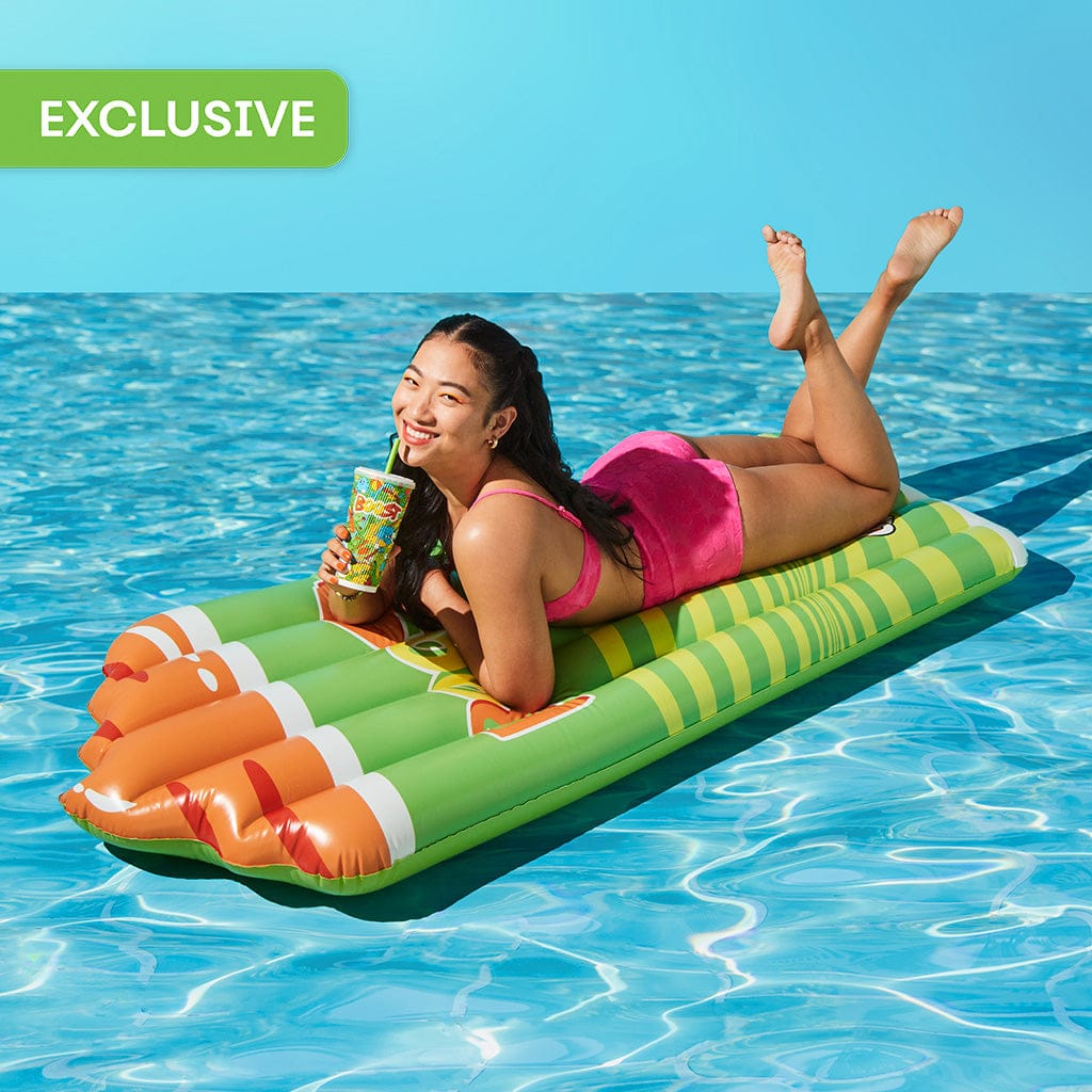 Woman floating on Wahu x Boost Cup Float