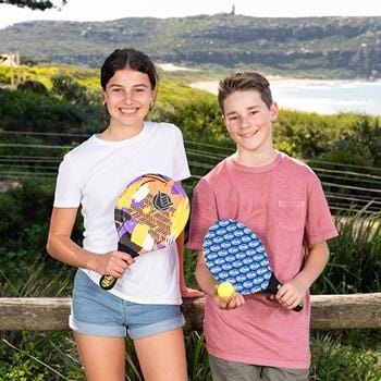 two friends at the park with Wahu Bash set