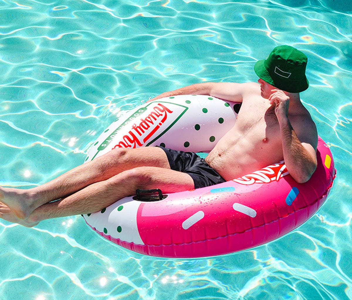 Wahu Big Dough x Krispy Kreme being used by man in swimming pool