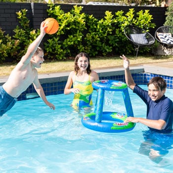 three friends playing Wahu Pool Basketball 