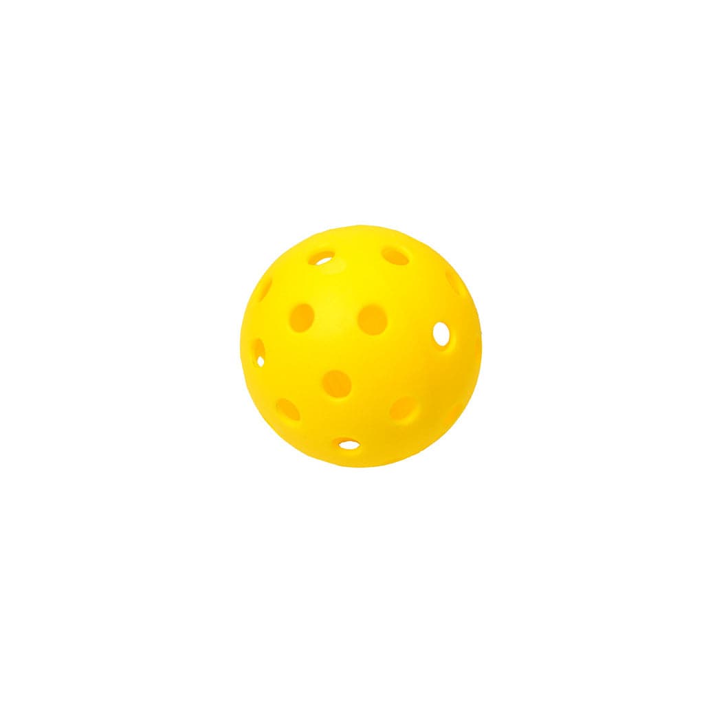 Yellow plastic ball with holes on a white background