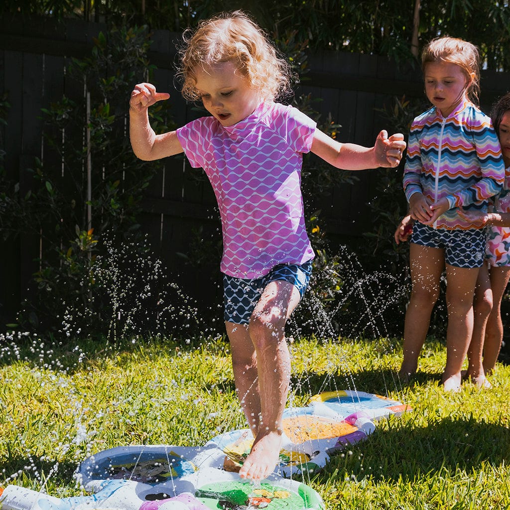 Kids playing in backyards on Wahu Mickey &amp; Friends Hop, Skip &amp; Splash