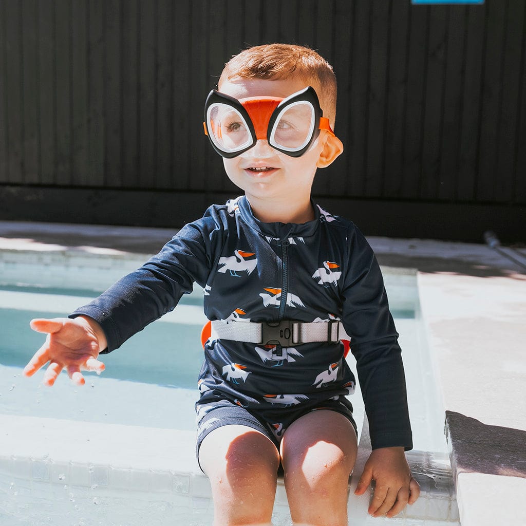 Young boy wearing Wahu Spidey &amp; Friends Mask Goggles by pool