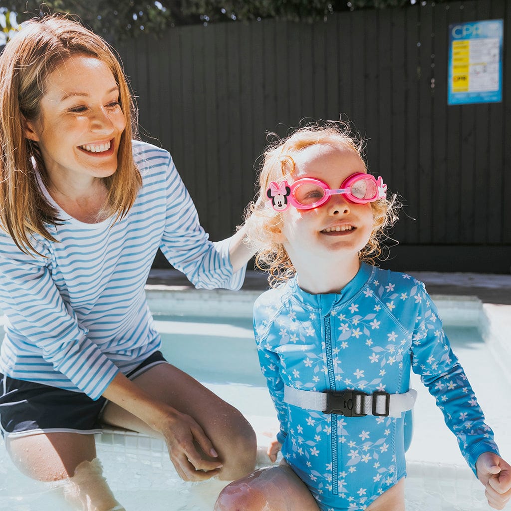 Mother and Daughter wearing Wahu Minnie Mouse Swim Goggles by the pool 