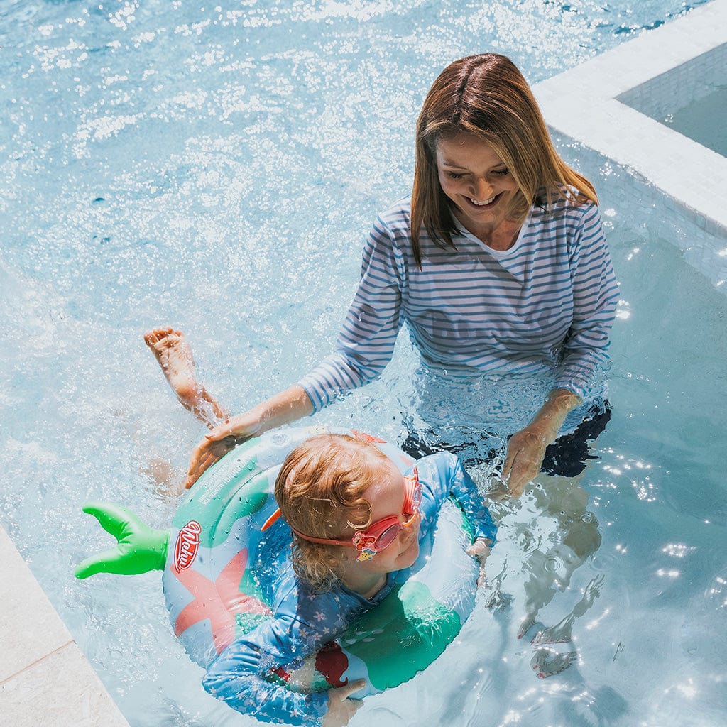 Mother and daughter in pool with Wahu The Little Mermaid Swing Ring