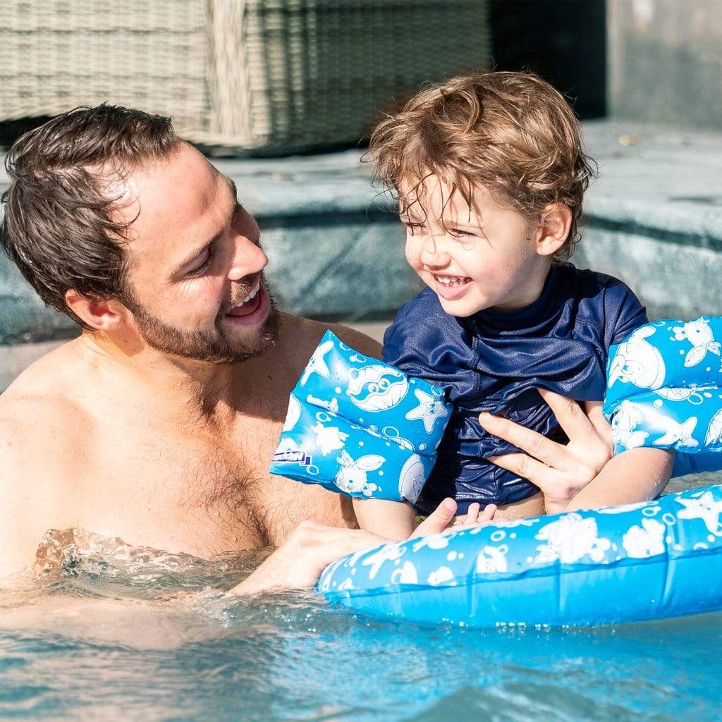 Family in pool child wearing Wahu Junior Armband Small