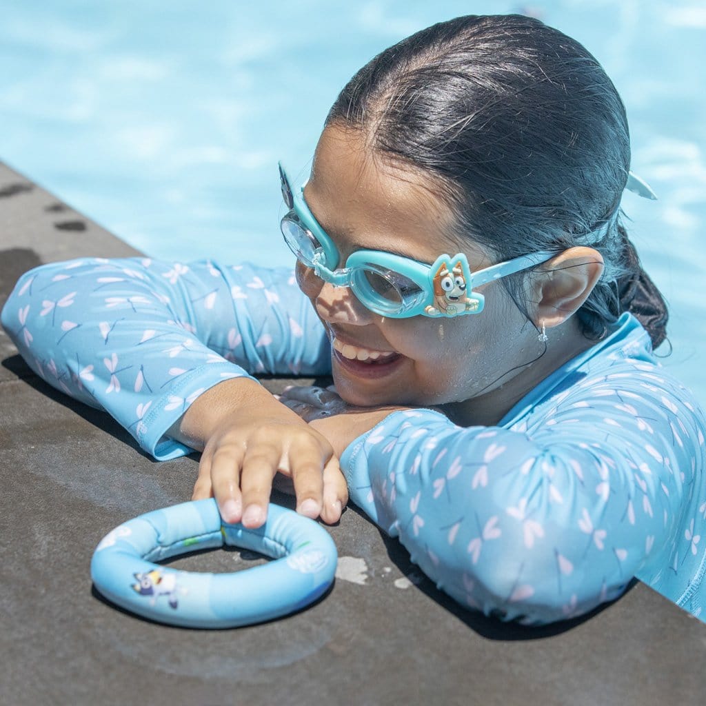 Child in pool wearing the Wahu x Bluey Goggles